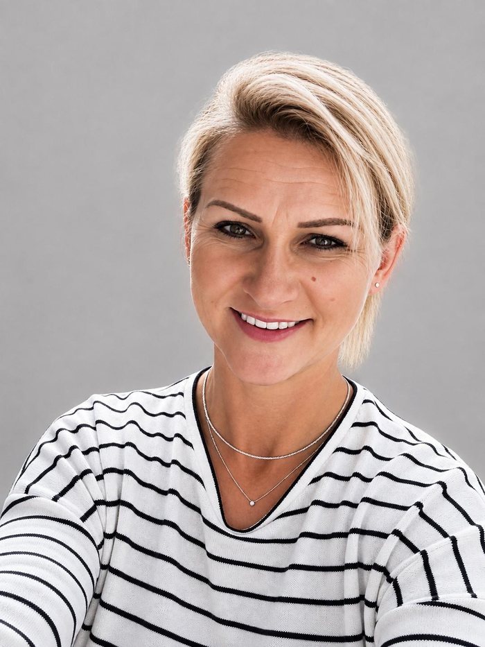 Birgit Ziegler, DGKP und Wundexpertin, lächelnd im Portrait
